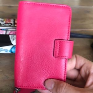 coach wallet-holds a phone